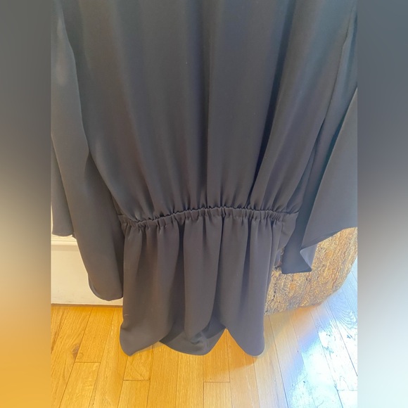 Ramy Brook size medium great black dress. It’s polyester. Lined. Looks silky. - Picture 4 of 5